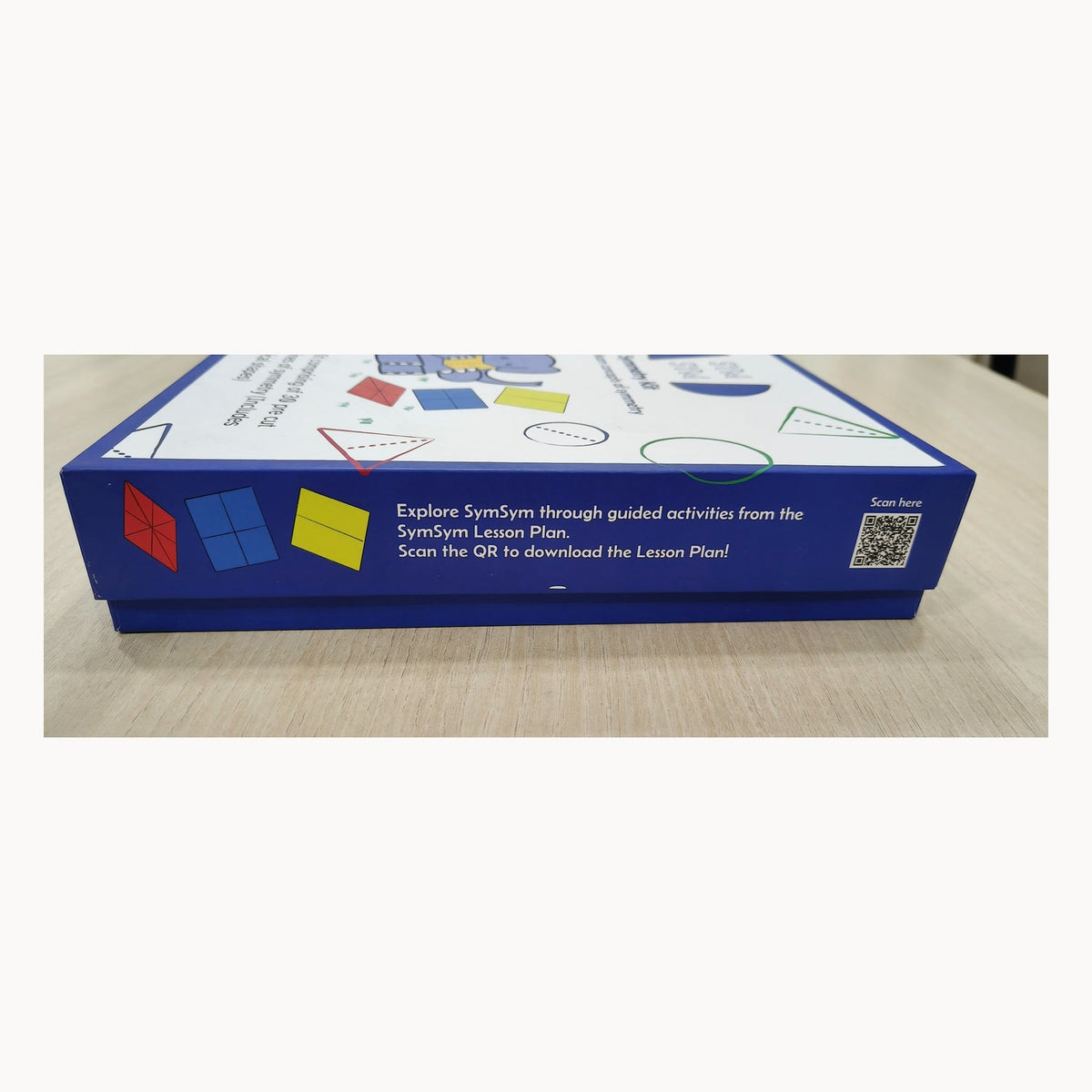 SymSym symmetry kit packaging with QR code for guided SymSym lesson-plan activities