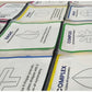 Close-up of pre-cut SymSym tactile shape packets showing examples of one, two and multiple lines of symmetry