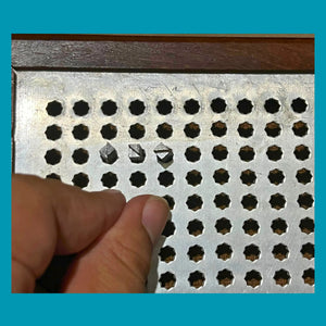 Algebra types inserted into Taylor Frame octagonal holes — accessible maths tool FOR BLIND