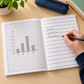 Bold Lines Combo Pad open to square graph paper on one page and wide-ruled writing lines on the facing page