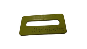 Green plastic tool with a rectangular shape and central cutout on a white background