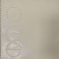 Page of the book with embossed circles