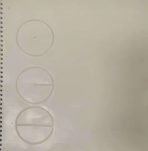 Page of the book with embossed circles