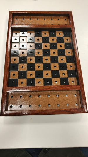 Wooden checkers board with checkers on a white background