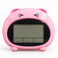 Front view of the pink DT-1602-E talking digital table clock with rounded ears, dark display frame and LCD screen